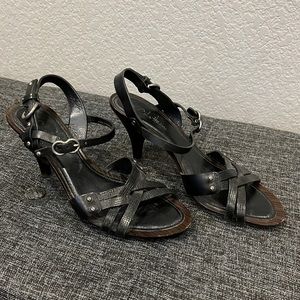 Cole Haan. 6. Beautiful heels. Black and brown. Gently worn.